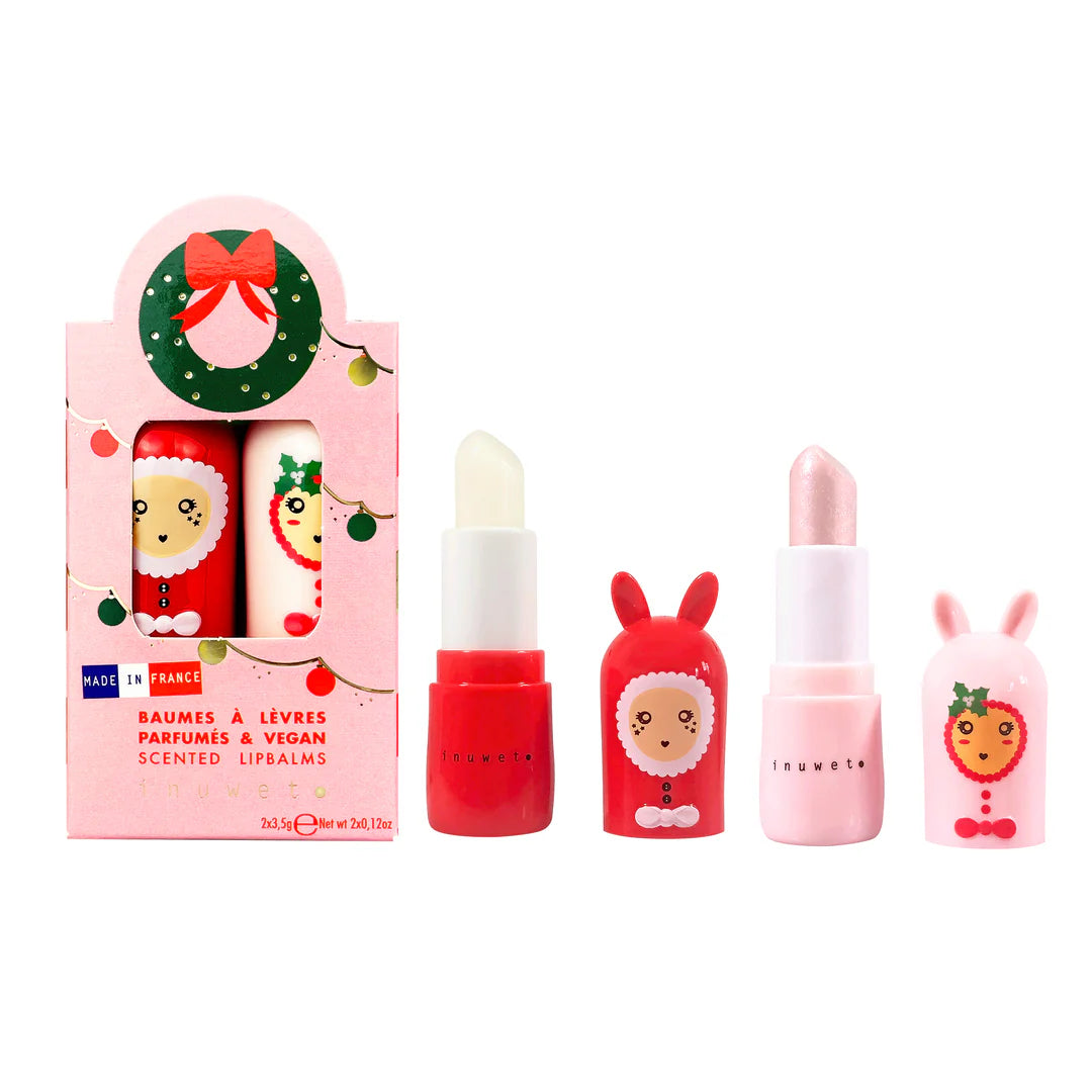 Inuwet Conjunto de 2 Bálsamos Labiais Manga e Candy, com embalagem festiva aberta, mostrando um bálsamo vermelho transparente e um rosa brilhante, ambos com capuzes de coelho.