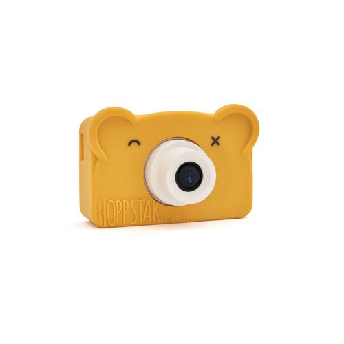 Vista frontal da Hoppstar Máquina Fotográfica Digital Rookie Yale, com a sua capa de silicone amarela em forma de urso.