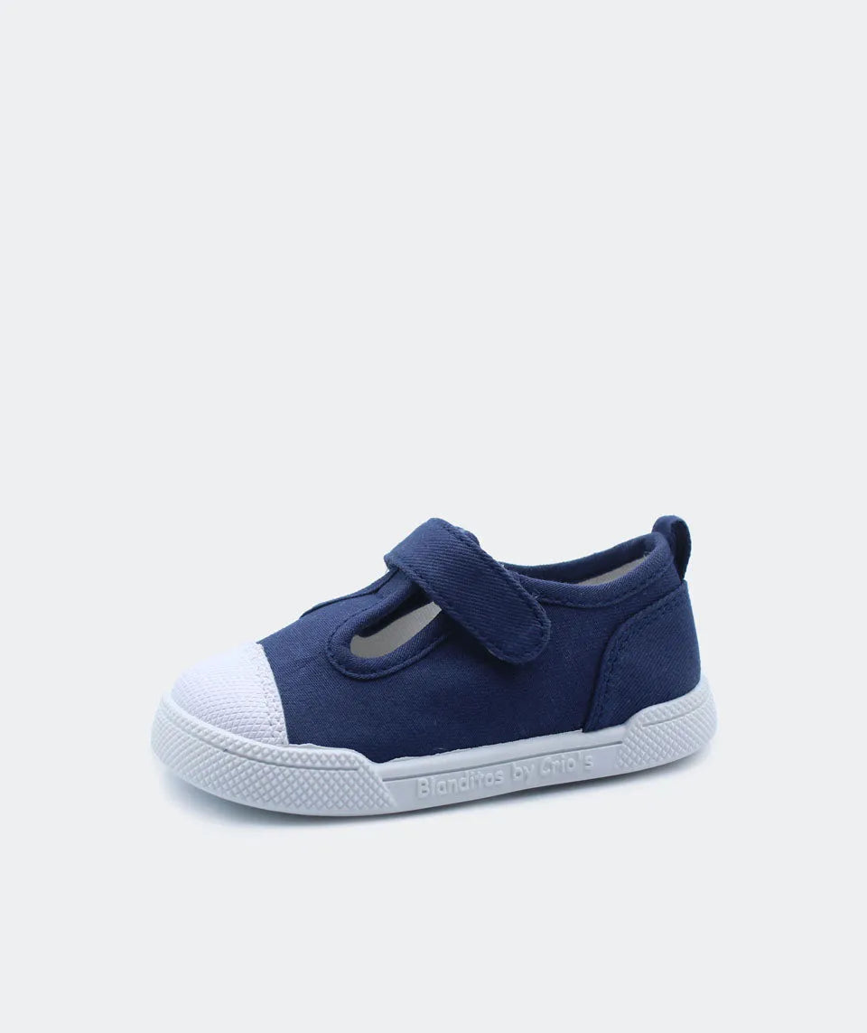 Calçado barefoot Blanditos by Crio's em lona navy, com sola branca e fecho em velcro. Ideal para o crescimento saudável dos pés.
