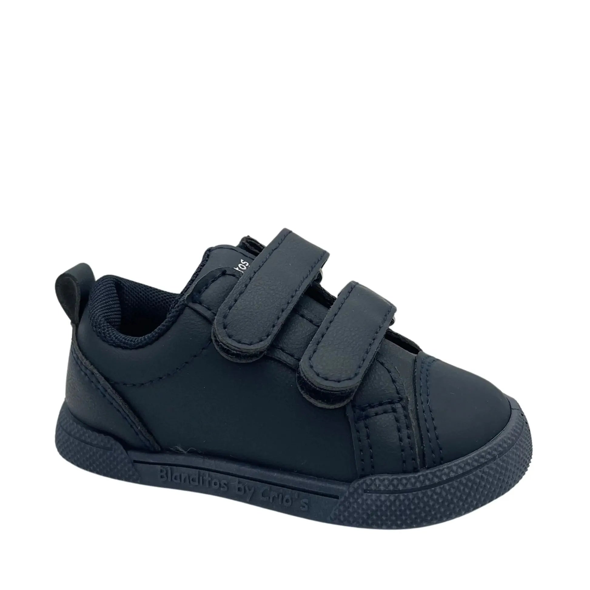 Sapato barefoot Blanditos by Crio's em lona vegana cor navy, com sola preta, biqueira larga e fecho em velcro para liberdade de movimentos e ajuste seguro.