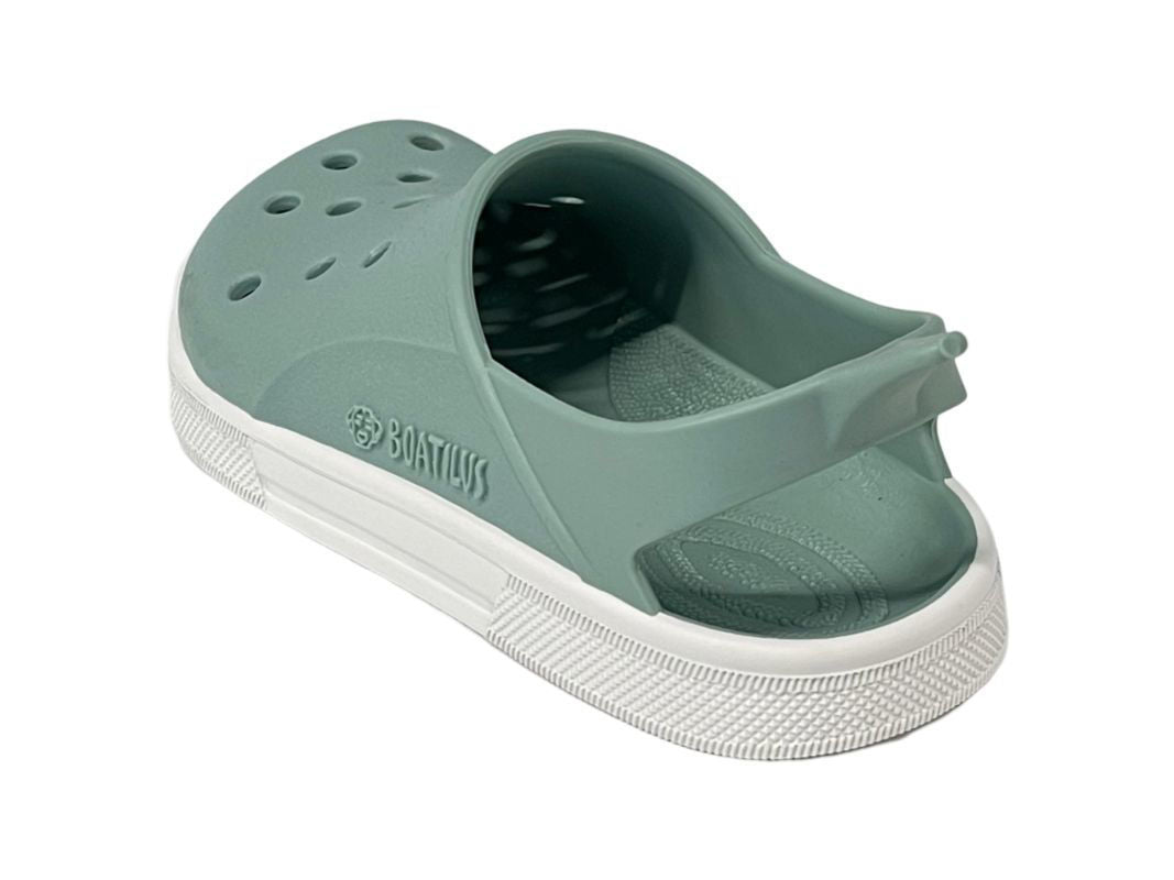 Detalhe da vista lateral da sandália barefoot Boatilus Cloggy Verde Pastel e Branco.