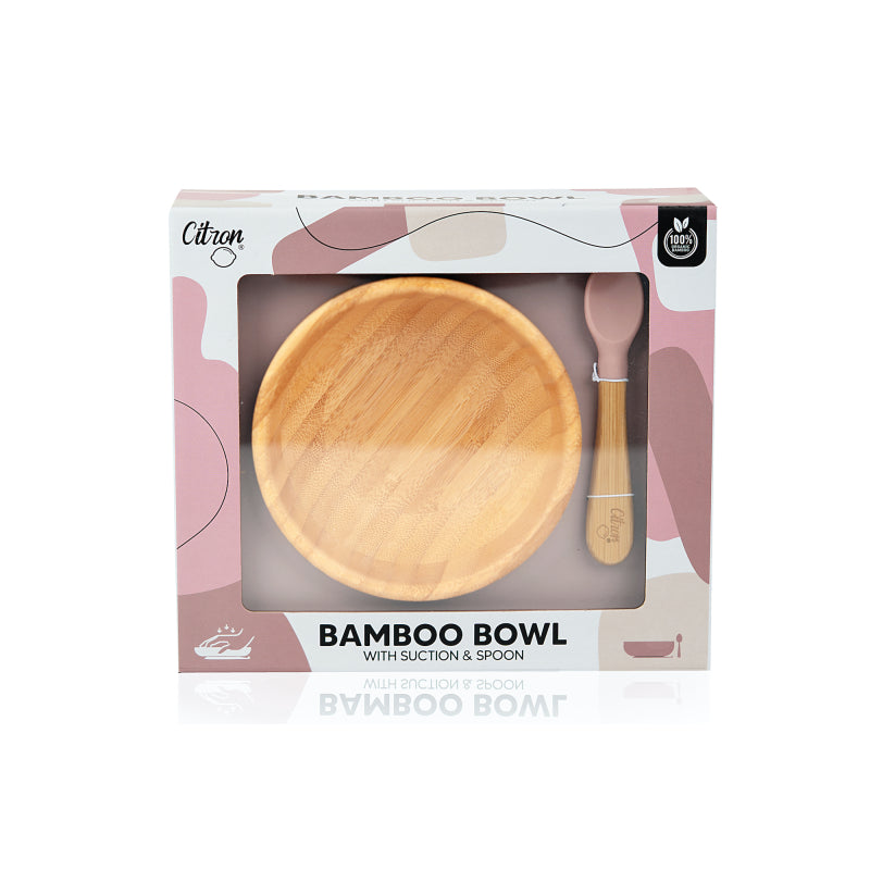 Embalagem do conjunto de alimentação Citron com tigela de bambu e colher de silicone rosa visíveis através de uma janela.