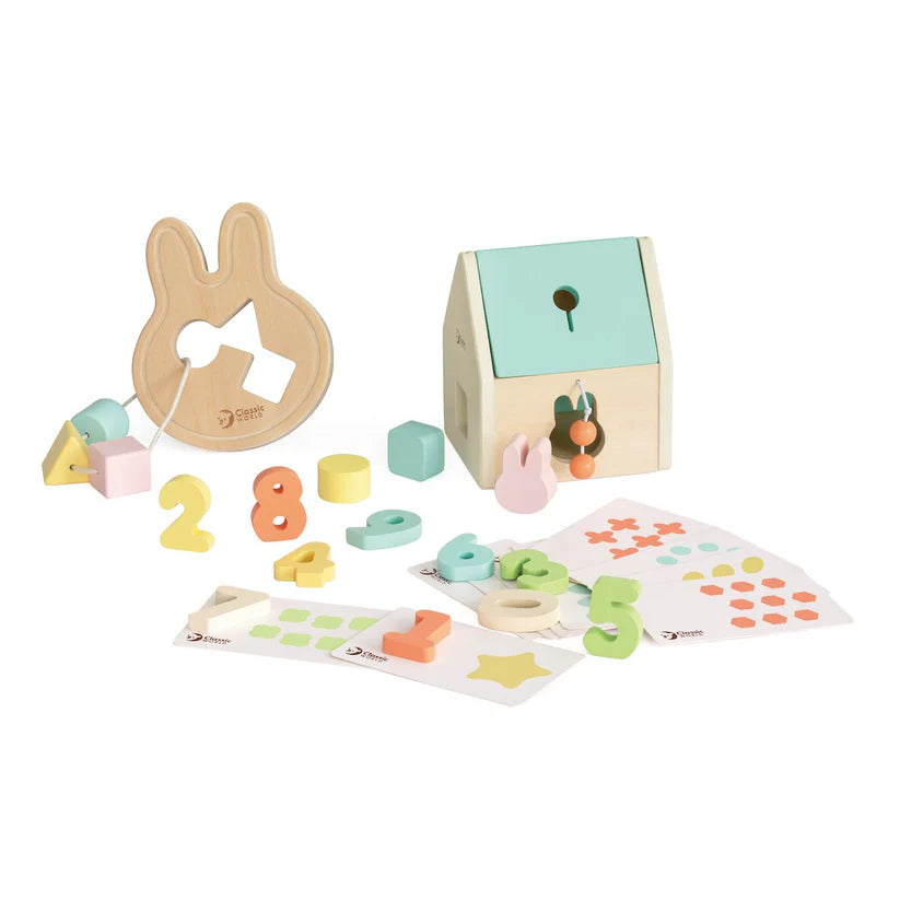 Conjunto completo Classic World Hellobox 12 meses, com picareta, martelo, puzzle de formas e mordedor, ideal para bebés a partir de um ano.