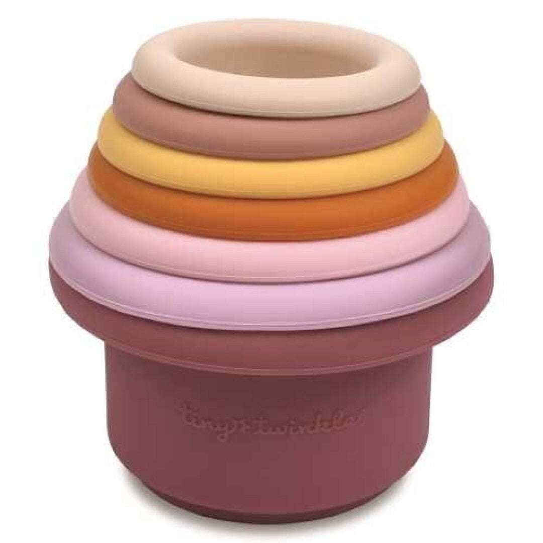 Conjunto completo de 7 vasos de silicone Tiny Twinkle empilhados, mostrando as cores e o tamanho de cada peça.