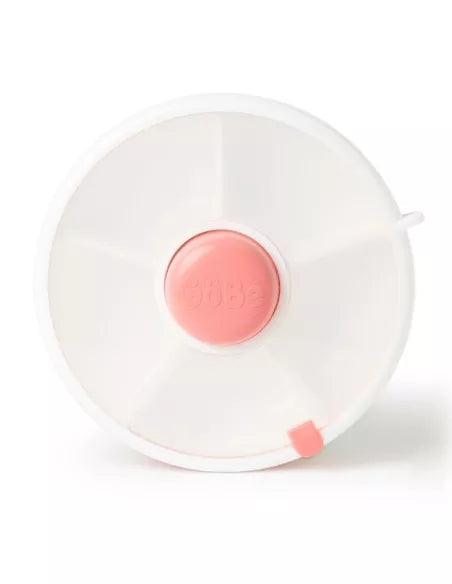 Lancheira GoBe Snack Spin de 21 cm fechada, vista de cima, com o botão central rosa e o mecanismo de rotação.