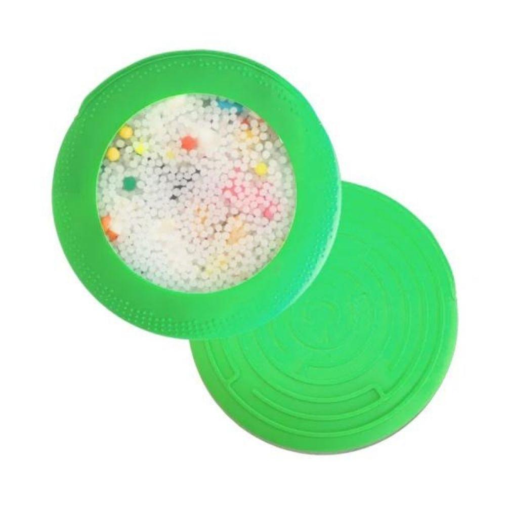 Jellystone Peekaboo Bag verde, vistas de cima (contas) e de baixo (labirinto).