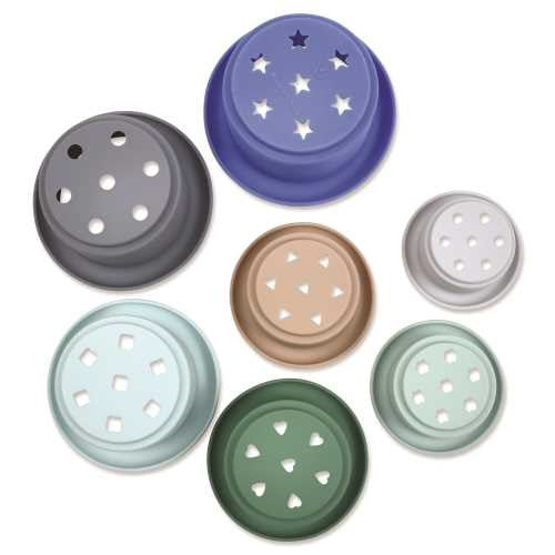 Vista aérea dos 7 vasos de silicone Tiny Twinkle, mostrando as cores e os diferentes padrões de perfurações.