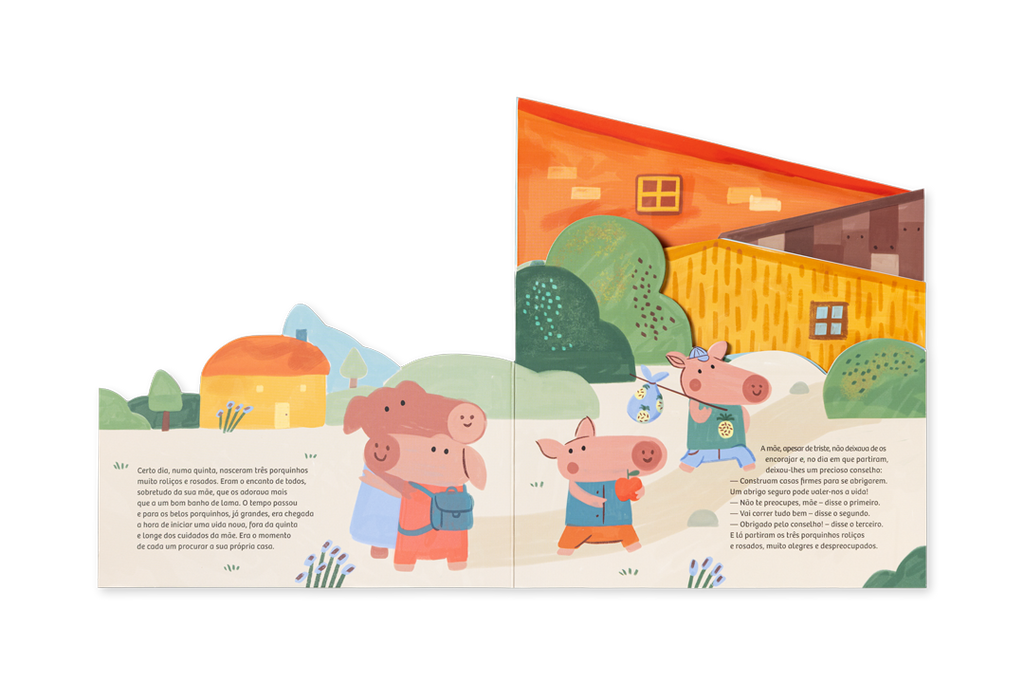 Livro acordeão Os Três Porquinhos aberto, a mostrar os cenários recortados das casas