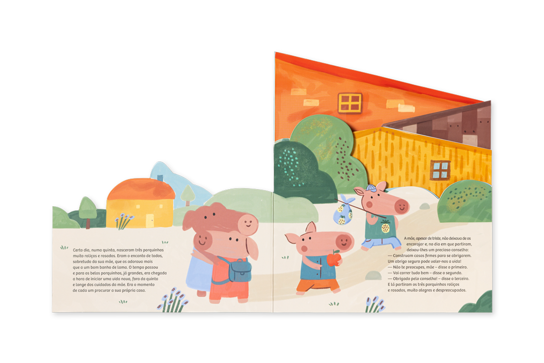 Livro acordeão Os Três Porquinhos aberto, a mostrar os cenários recortados das casas