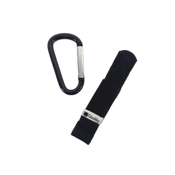 Buggy Clips Quokkababy em uso, com um saco preso à pega do carrinho