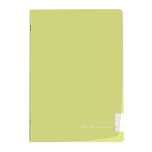 Caderno agrafado FEGOL com capa plastificada em tom verde pastel claro, vista frontal, com detalhe do canto inferior direito.