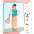 Capa do jogo magnético Djeco Inzebox Dressing, mostrando uma figura vestida com roupa e chapéu, ao lado da caixa e peças magnéticas.
