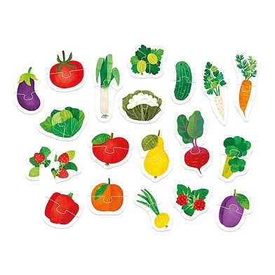 Todas as 19 peças de puzzles de frutas e vegetais da Banana Panda espalhadas, mostrando a variedade de ilustrações coloridas.