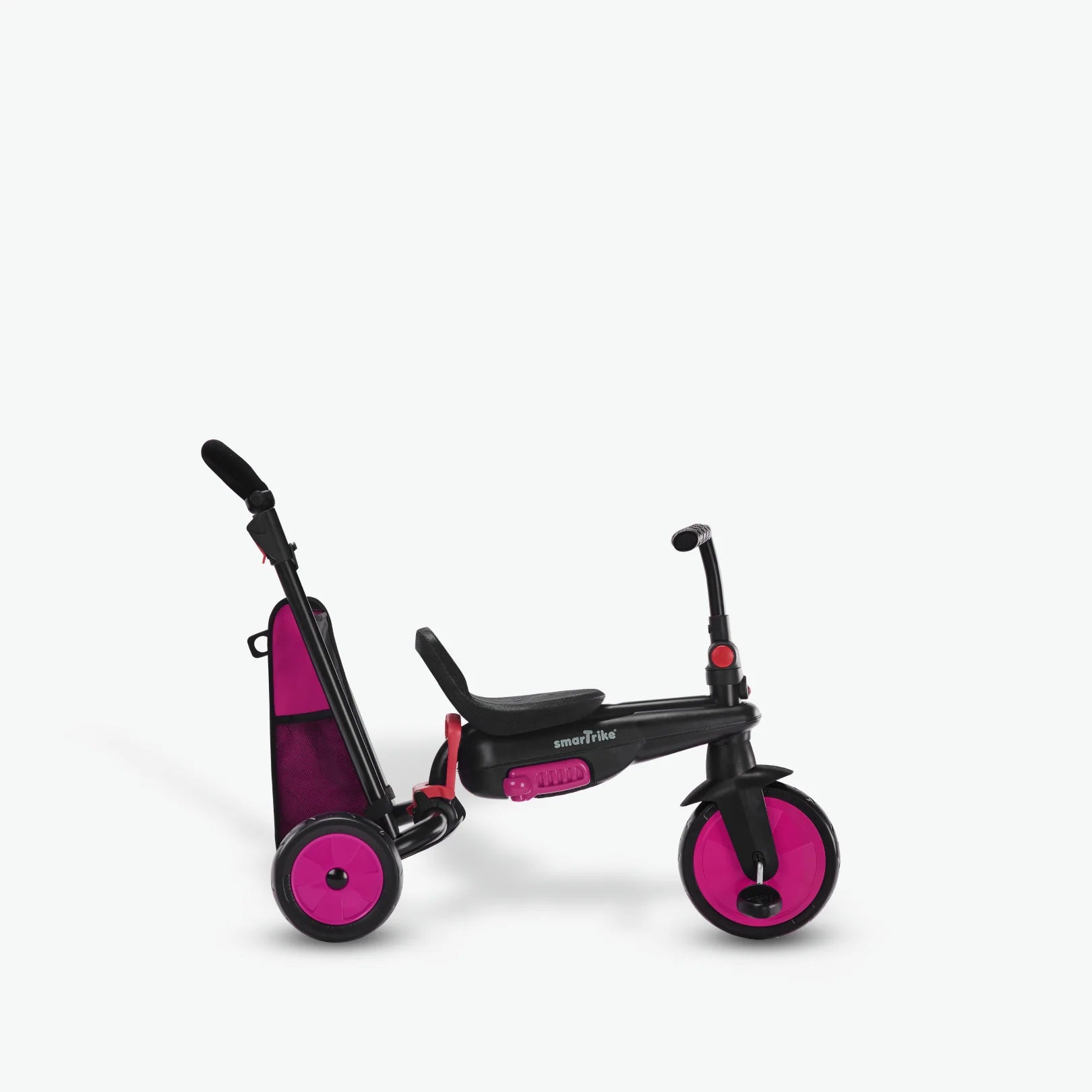 Triciclo SMARTRIKE STR3 rosa convertido no modo de triciclo independente, sem a pega parental e a capota, para crianças mais velhas.