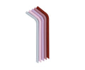 Conjunto de 5 palhinhas reutilizáveis de silicone Bendie Straws da We Might Be Tiny, nas cores Earth and Bloom, dispostas em leque.