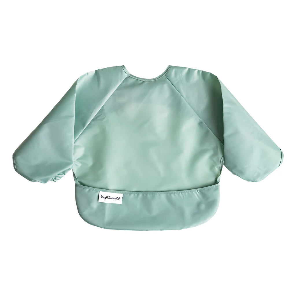 Babete Tiny Twinkle com mangas na cor verde menta, exibido em plano num fundo branco, detalhando o bolso frontal e a etiqueta.