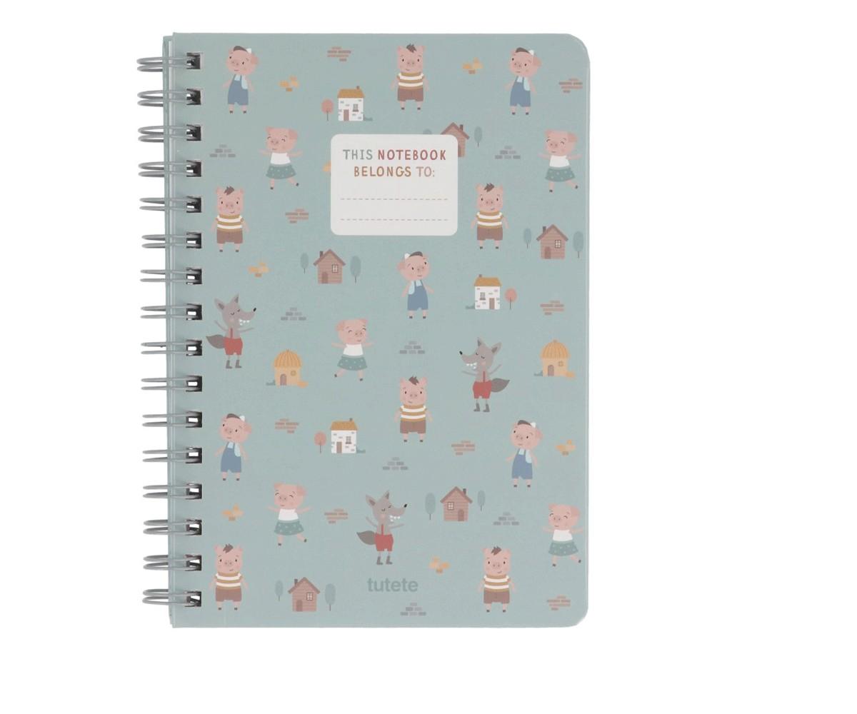 Caderno Escolar Tutete com capa verde-água e padrão dos Três Porquinhos e Lobo Mau, com espiral.