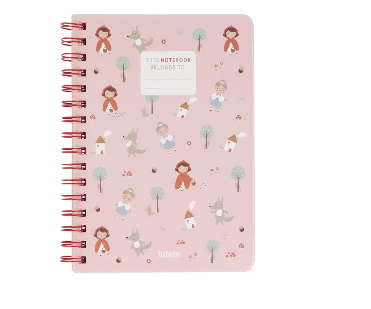 Caderno Escolar Tutete com capa rosa e padrão da Capuchinho Vermelho, com espiral vermelha.