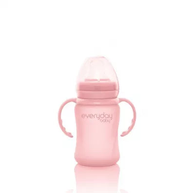 Biberão de aprendizagem Everyday Baby de 150ml em rosa, com asas e tampa, em fundo branco.