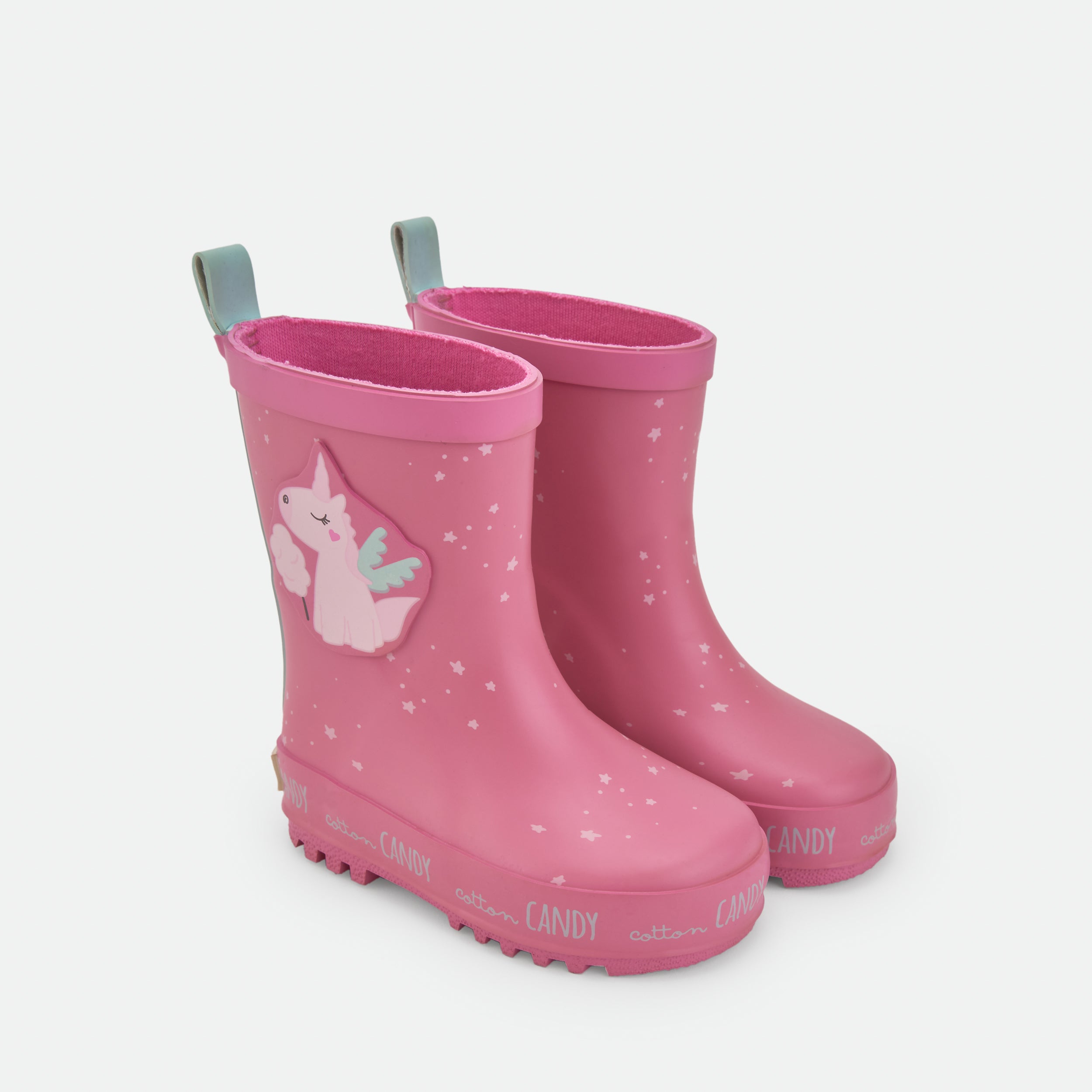 Par de galochas Waterlemon cor-de-rosa para crianças, com um unicórnio em relevo e estrelas brancas, vista frontal ligeiramente lateral.