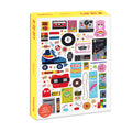 Caixa do puzzle Happily in the 80's de 1000 peças, mostrando a arte vibrante com ícones da década de 80, como um walkman, um urso carinhoso e um cubo mágico.