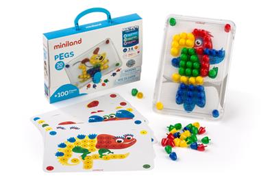 Jogo Miniland Pegs 100 peças 20mm, com caixa, placa transparente com papagaio colorido, fichas modelo com dinossauro e pinos sortidos.