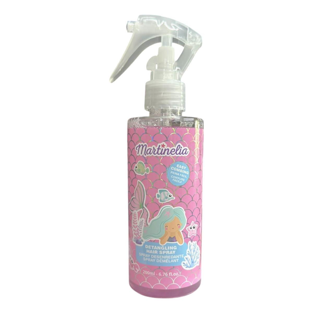 Frasco do Martinelia Spray Desembaraçador de Cabelo com 200ml, com um rótulo rosa decorado com uma sereia e peixes, ideal para crianças.