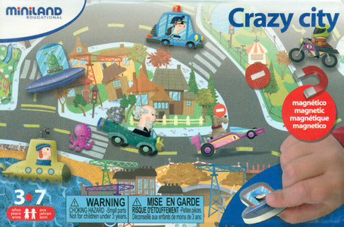 Jogo Miniland Magnético - Crazy City em caixa, com tabuleiro ilustrado e peças magnéticas de veículos e personagens divertidos.