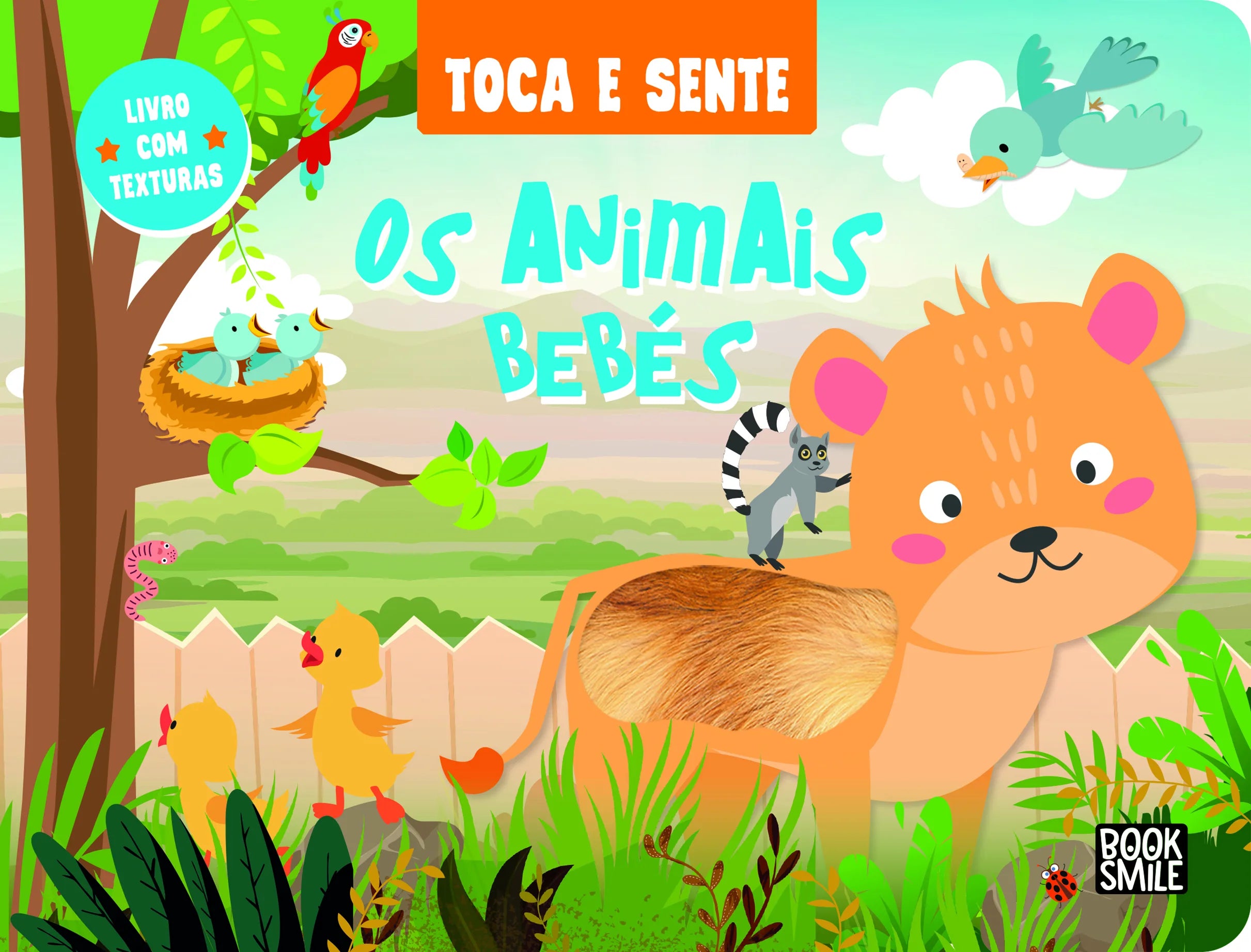 Capa do livro infantil "Toca e Sente - Os Animais Bebés" com ilustrações coloridas de animais e um painel de textura de pelo de leão visível.