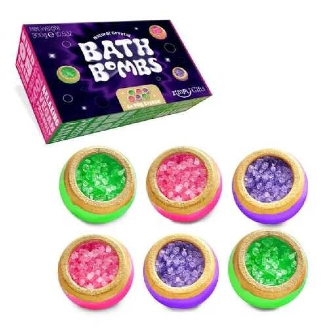 Caixa do pack presente ZIMPLIKIDS de 6 bombas de banho com cristais, acompanhada pelas seis bombas de banho individuais em cores vibrantes como verde, rosa e roxo, com cristais visíveis.