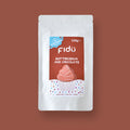 Embalagem branca tipo saco zip-lock do Fidu Buttercream Mix Chocolate, com rótulo castanho e indicação de 125g, sem glúten, sem leite e vegan.