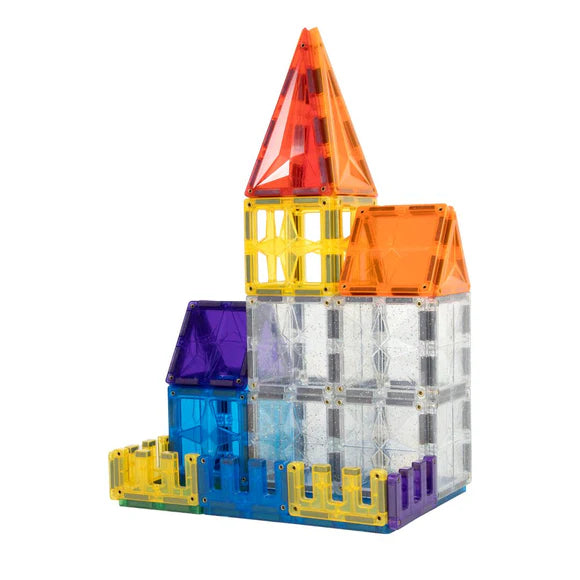 Edifício pequeno e colorido construído com blocos magnéticos Clever Clixx, mostrando peças com glitter.