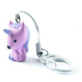 Porta-chaves Djeco Tinyly com figura de unicórnio rosa e roxo, preso a um mosquetão branco.
