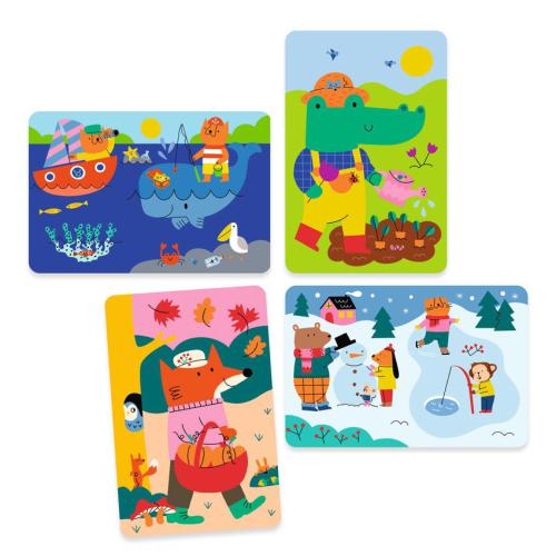As quatro tábuas coloridas do kit Djeco Actividades Pintura com água - 4 Estações, mostrando cenas de verão, primavera, outono e inverno.