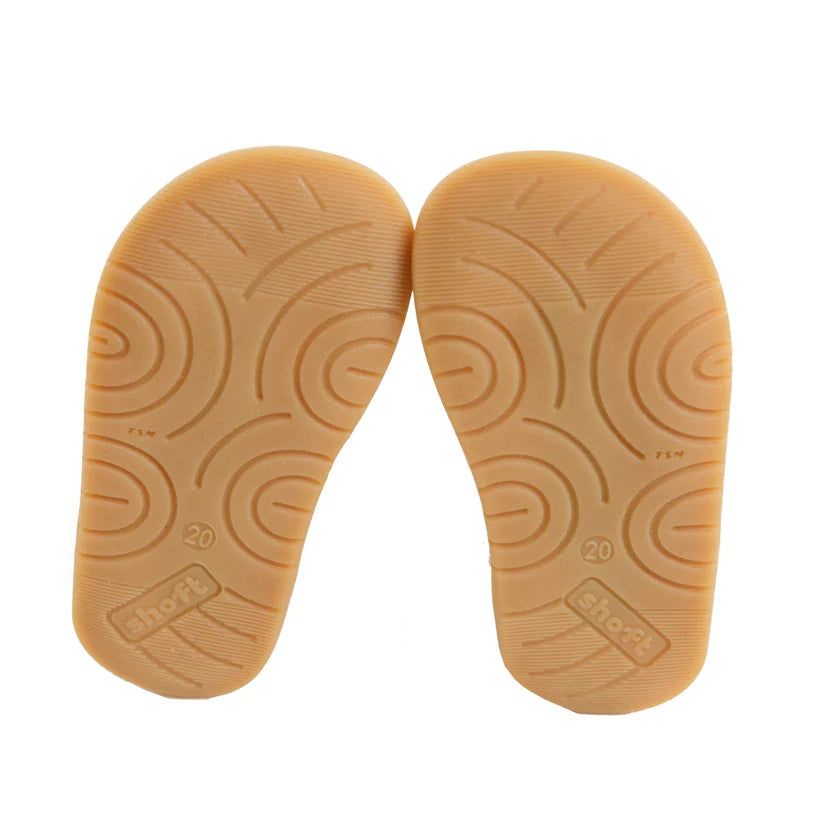 Vista das solas de dois sapatos Bunny Barefoot, exibindo o padrão antiderrapante flexível e a indicação de tamanho.