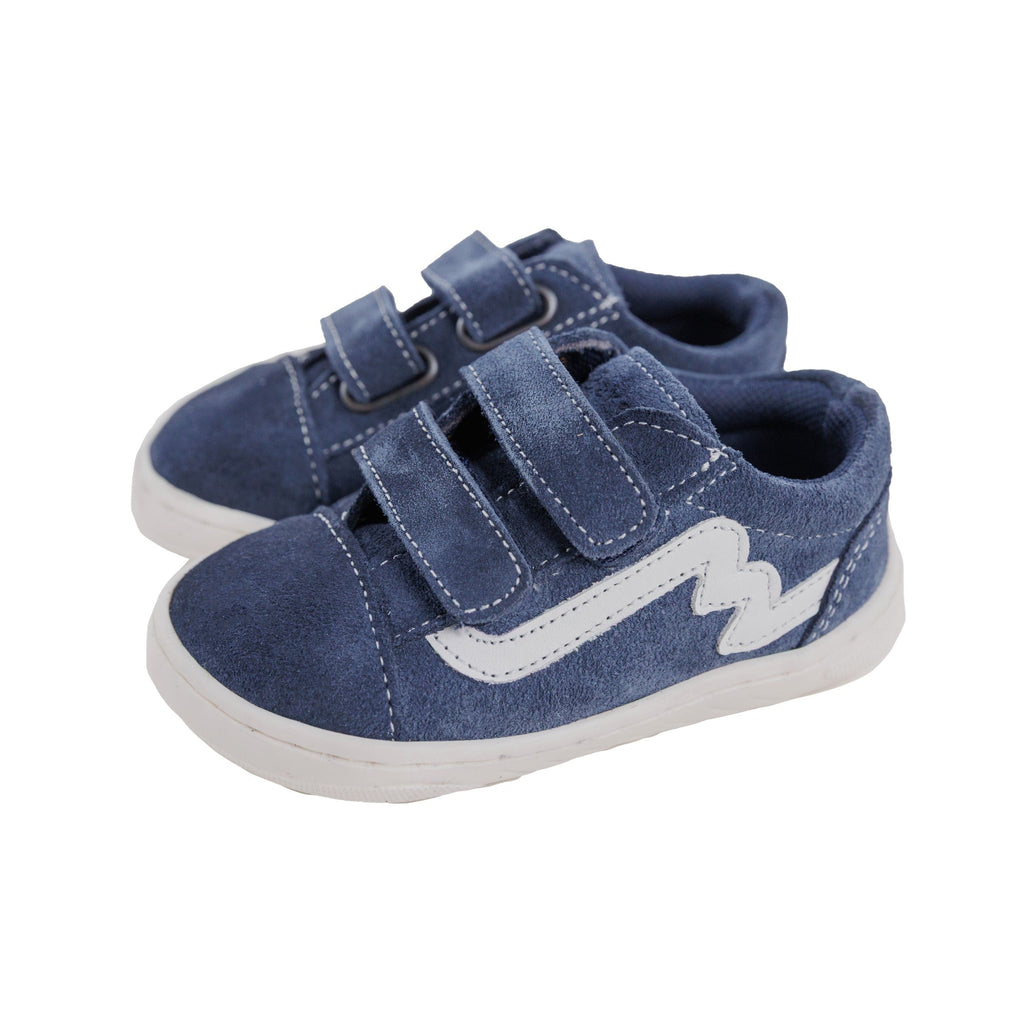Sapatilhas Bunny Barefoot Zebra Azul Marinho com duplo velcro e risca branca, vista lateral.