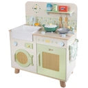 Vista frontal ligeiramente angular da Classic World Natural Kitchen, destacando o fogão, forno, lava-loiça e máquina de lavar roupa.