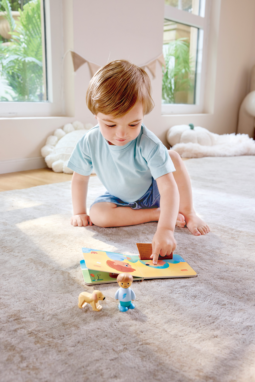Hape Libro y Muñecos - Hapeland Dogs New Friend