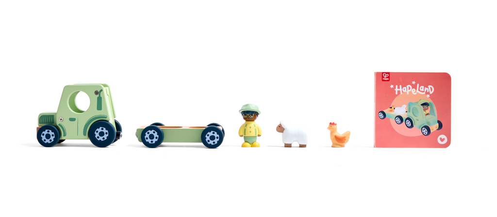 Hape Trator Barulhento e livro