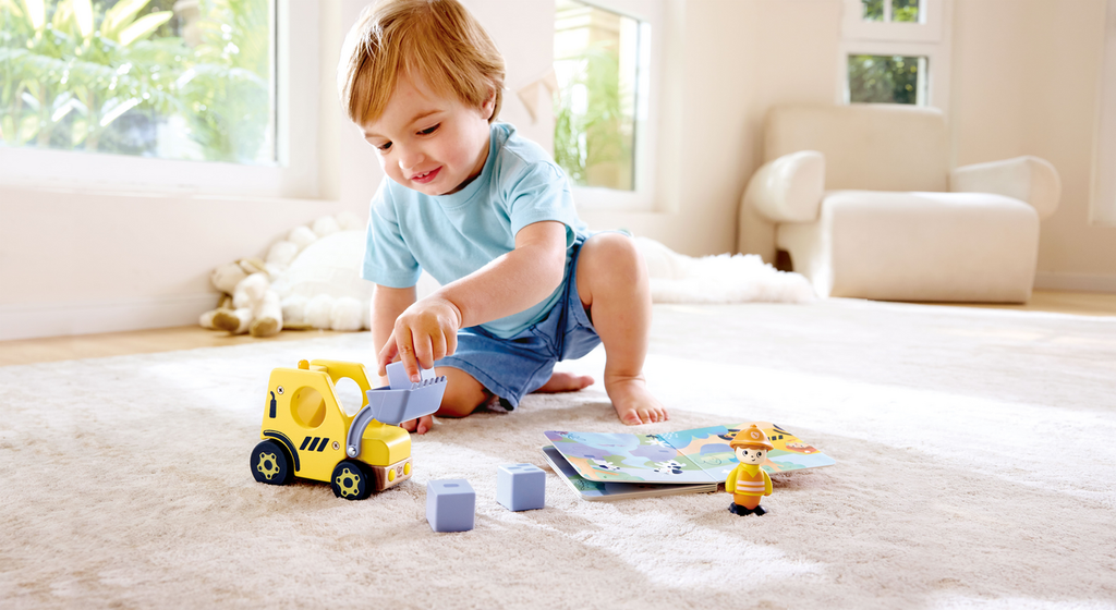 Hape Veículo Construção e livro