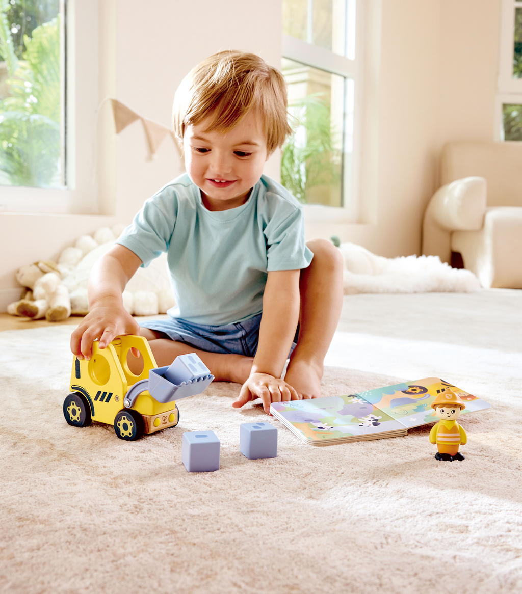 Hape Veículo Construção e livro