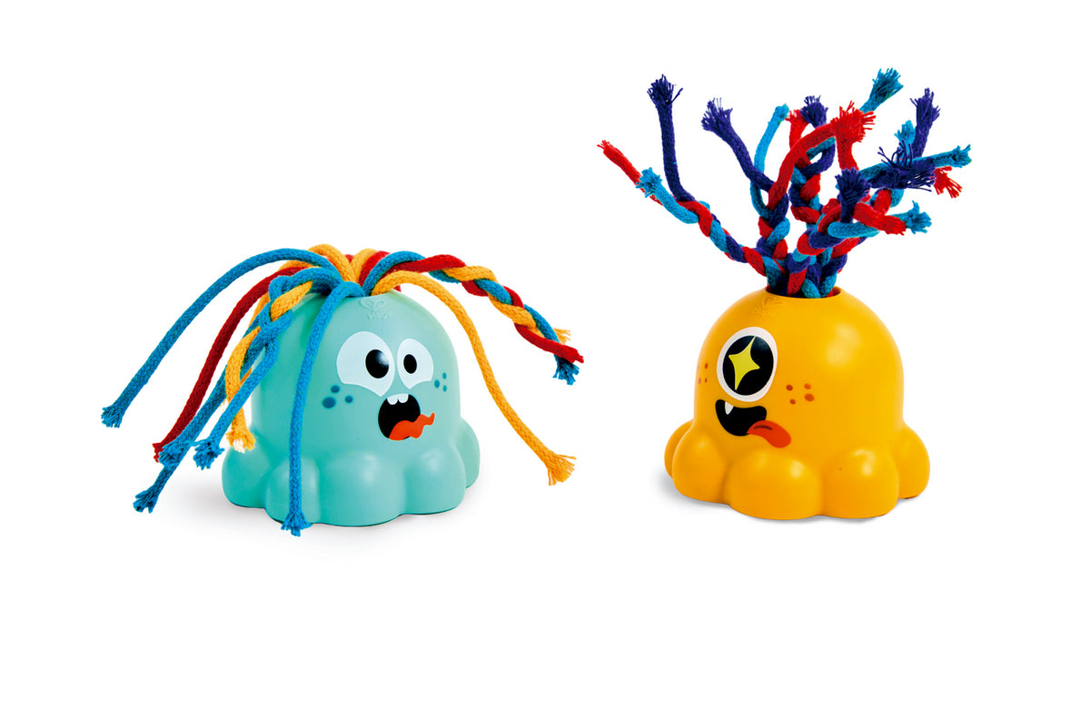 Brinquedos Hape Noisy Alien em azul e laranja, com cabelo de cordões coloridos