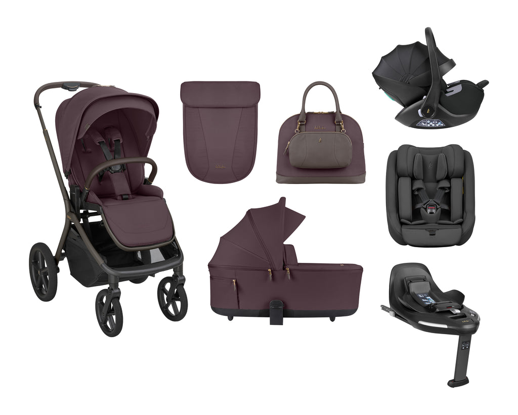 Imagem de um conjunto completo de carrinho de bebé Kikkaboo Goya Platinum em cor bordeaux/púrpura, mostrando o carrinho, alcofa, mala, ovo, cadeira auto e base ISOFIX.