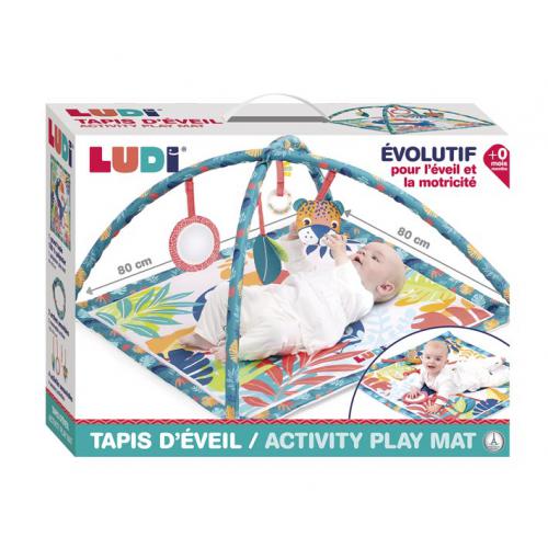 Embalagem do Ludi Tapete de Atividades Tucano, com imagem de bebé a brincar e indicações de "Évolutif pour l'éveil et la motricité" e "+0 mois".