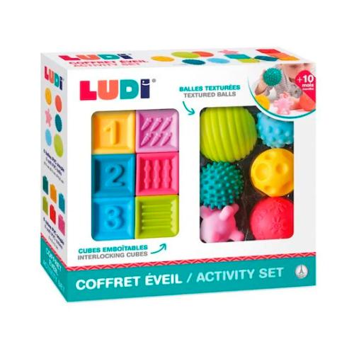 Caixa do Ludi Conjunto de atividades sensoriais, com cubos e bolas sensoriais visíveis, destacando o design colorido e as funcionalidades para bebés a partir dos 10 meses.