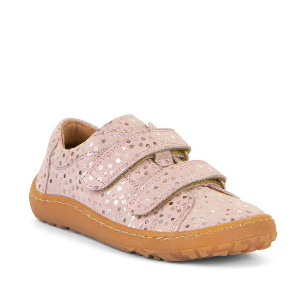 Sapatilha barefoot infantil em couro rosa com estampado de bolinhas brilhantes. Fecho em velcro duplo e sola em borracha natural, proporcionando flexibilidade e conforto.

