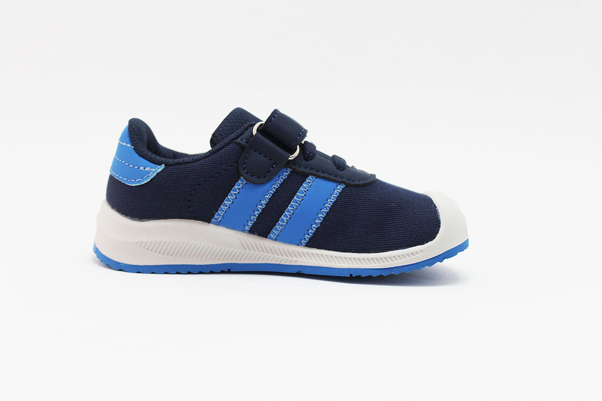 Sapatilha infantil BabyFree barefoot azul escura com riscas azuis claras e sola branca, vista lateral.