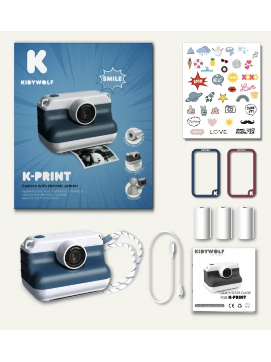 Conteúdo da caixa da KidyWolf K-PRINT, mostrando a câmara, rolos de papel, autocolantes e manuais.