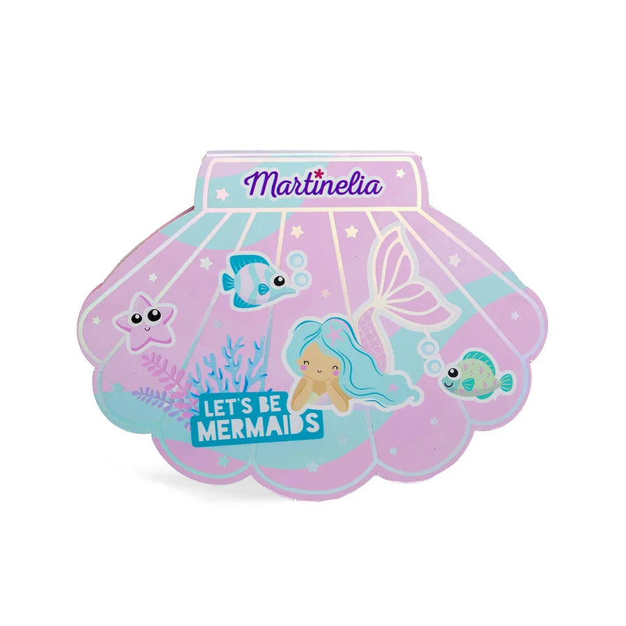 Martinelia Paleta de maquilhagem Lets Be Mermaids fechada, em forma de concha com ilustrações de sereia e elementos marinhos.
