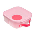 Recipiente de almoço b.box mini rosa, fechado, com fecho vermelho e pega lateral.